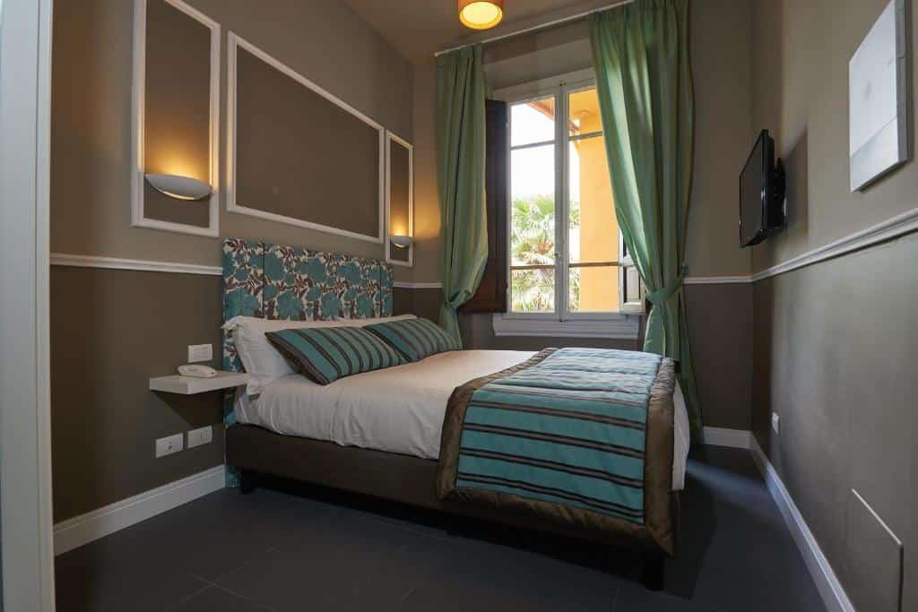 Habitación Economy en tonos turquesa